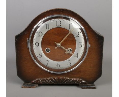 An Andrew oak cased mantle clock featuring Perivale movement.  