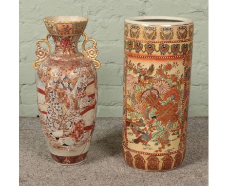 Two pieces of oriental ceramics to include large twin handled vase and umbrella/stick stand.  