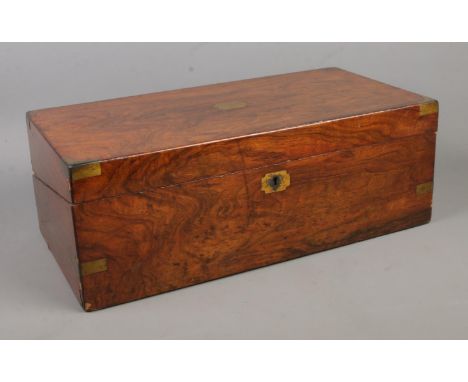 A Victorian mahogany writing box, with leather insert, pen tray, inkwell and storage. Height: 18cm, Width: 50cm, Depth: 26cm.