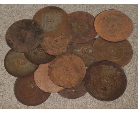 A collection of symphonion/polyphon discs. 7 x 30cm diameter, 8 x 27cm diameter.  