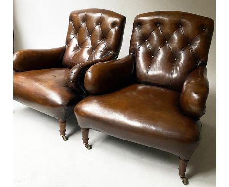 ARMCHAIRS, a pair, 82cm W,  19th century oak, in the Howard manner, with button natural leather and turned front supports. (2