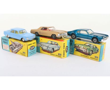 Three Boxed Vintage Corgi USA Cars, 229 Chevrolet Corvair, pale blue body, lemon interior, flat spun wheel hubs, in near mint