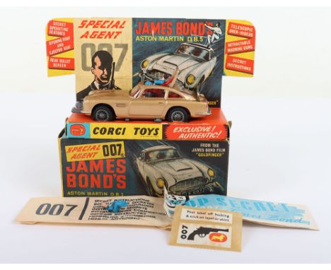 Corgi Toys 261 James Bond Aston Martin D.B.5 from the Film Goldfinger, gold body, with ejector seat, James Bond and bandit fi
