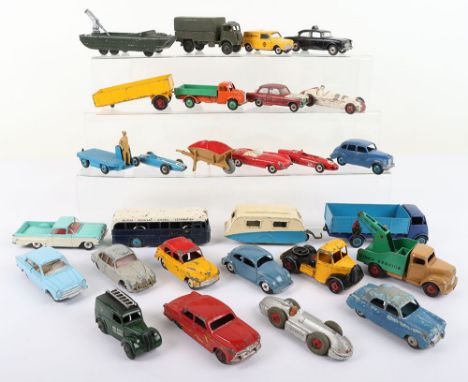 A Quantity of Vintage un-boxed Play-worn Dinky Toys, including:105B wheel barrow, AA Mini Van, Humber Hawk Police Car, Guy Lo