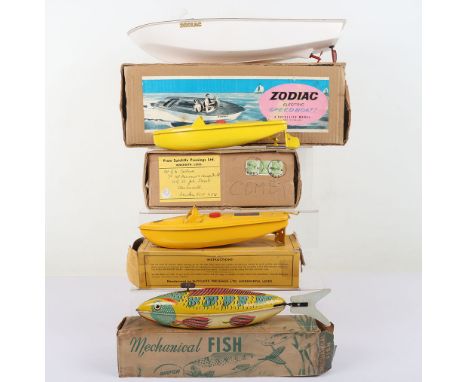 Three Sutcliffe Speedboats, boxed clockwork yellow Comet speedboat, 23.5cm (9 ¼”) long, in good working condition, fair origi