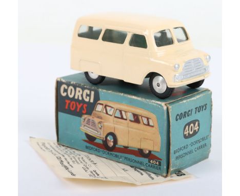 Corgi Toys 404 Bedford Dormobile Personnel Carrier, cream body, silver trim, flat spun wheels in mint original condition, ear