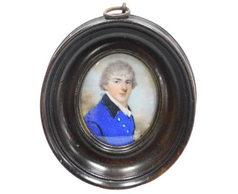 English School (19thC).  Bust portrait of gentleman, in vivid blue jacket, watercolour, framed, 7cm x 5.5cm.