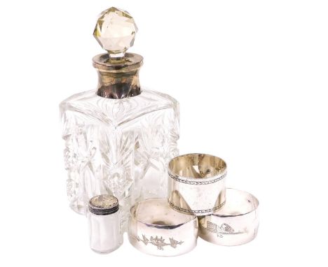 A George V cut glass perfume bottle, with silver mount, Chester 1923, George V silver napkin ring, Sheffield 1920, 1.03oz, pa