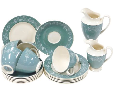 A Royal Doulton porcelain Cascade pattern part tea service, comprising two graduated cream jugs, five teacups, six saucers an