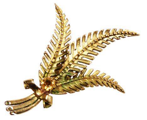 A 9ct gold and citrine brooch, of tied three leaf fern form, 8.5g.
