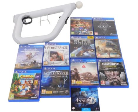 A Sony PlayStation VR Aim controller, Cechya-ZRA2, boxed, together with PlayStation games.