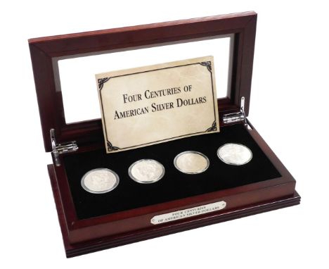 A Four Centuries of American Silver Dollars four coin set, comprising Portrait dollar 1783, Morgan dollar 1880, Peace silver 