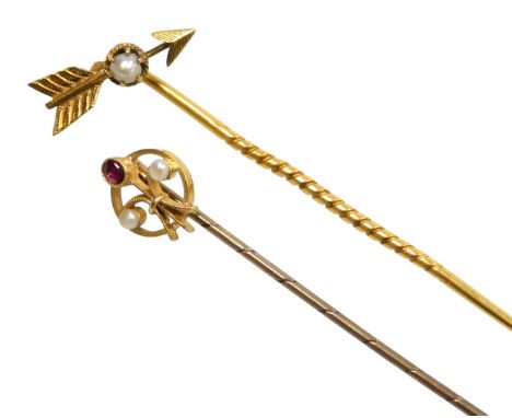 A seed pearl set arrow tie pin, in yellow metal, marked CW to arrow, 2.0g, together with an Edwardian ruby and seed pearl tie