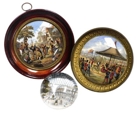 A mid 19thC glass paperweight, decorated with The Great Exhibition, Crystal Palace, bears paper label to base, 7.5cm wide, to