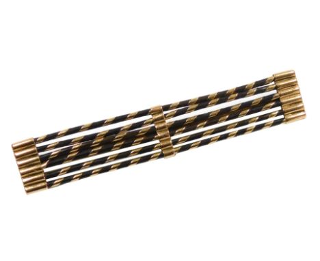 An ebony bar brooch, of six rod form, bound in yellow metal, stamped 9ct, 6.4g all in.