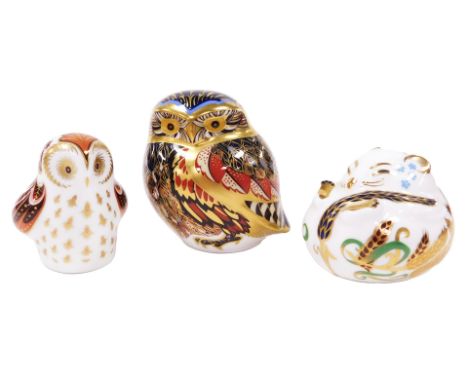 A Royal Crown Derby Imari porcelain paperweight, modelled as a little owl, gold stopper, together with an owlet, and a sleepi