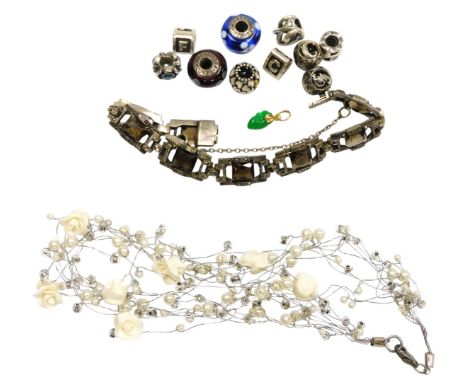 Assorted Pandora beads, together with a mid century smokey quartz and marcasite bracelet, one quartz lacking, on a snap clasp