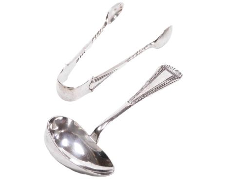 A pair of Victorian silver sugar tongs, Sheffield 1897, 0.85oz, together with a silver plated ladle. 