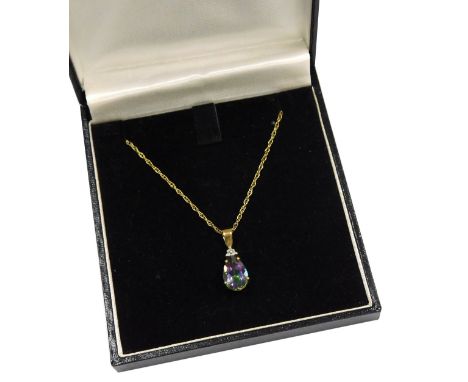 A 9ct gold mystic topaz and diamond pendant, the pear shaped topaz claw set, on a fine double oval link neckchain, with bolt 
