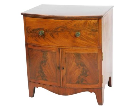 A 19thC mahogany bow fronted side cabinet, with a figured frieze drawer above two doors, on bracket feet, 72cm high, 64.5cm w