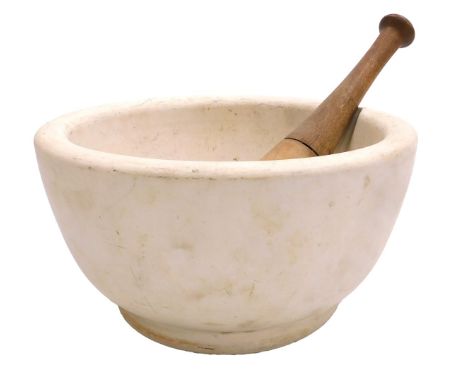 A stone pestle and mortar, the pestle with a turned wooden handle, mortar 26cm wide.