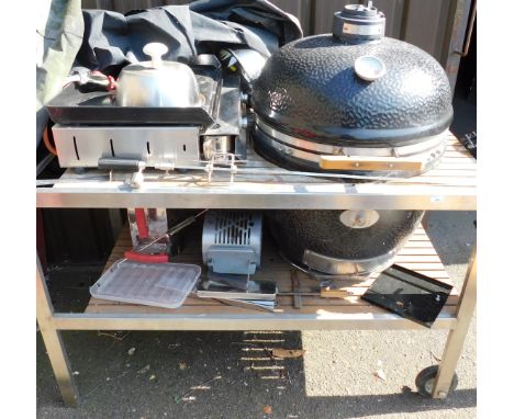 A garden kitchen, with metal and wooden slatted trolley, inset with large kettle style barbecue, gas hob, etc., 141cm wide. (