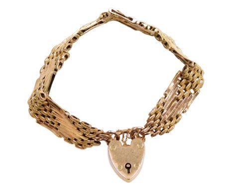A 9ct gold nine bar and textured gate bracelet, on a heart shaped padlock clasp, with safety chain as fitted, 21.5g.
