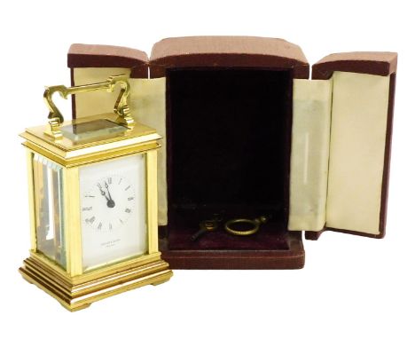 A Taylor &amp; Bligh miniature brass cased carriage clock, rectangular white dial bearing Roman numerals, Fema single barrel 