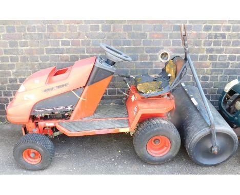 A Countax C500H garden tractor, and a roller attachment. (AF)
