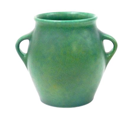 A early 20thC Pilkington's Royal Lancastrian green pottery vase, of twin handled ovoid form, shape no. 2919, impressed marks,