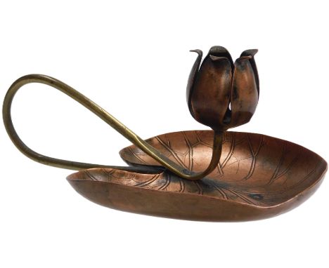 An Arts &amp; Crafts copper and brass chamber stick, manner of W A S Benson, modelled as lotus flower and leaf, 18cm wide.