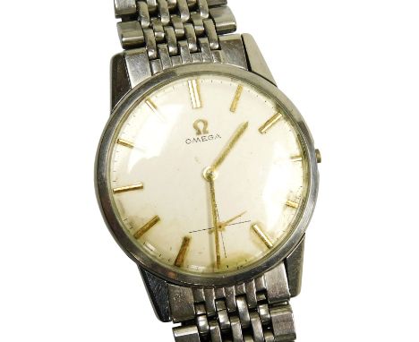 An Omega gentleman's stainless steel cased wristwatch, circular dial with gilt markers, subsidiary seconds dial, on a bracele