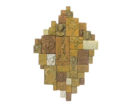 A Giovanni Schoeman bronzed collage, of forty three miniature relief plaques, Art Nouveau and Roman classical designs, 29cm h