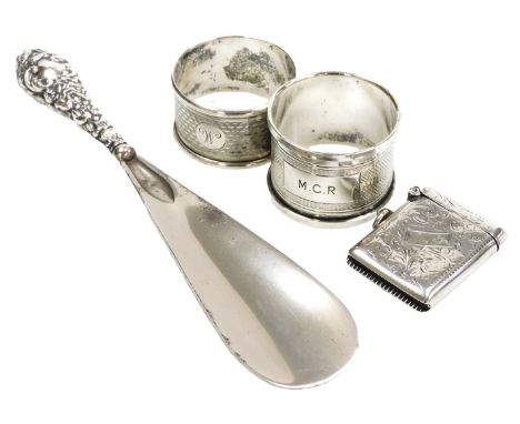 A George V silver vesta case, with engraved foliate decoration, rectangular reserve monogram engraved, Birmingham 1910, two s
