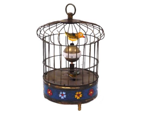 A late 20thC Chinese automaton birdcage clock, with two birds and globe dial marker, the cage with a frieze cloisonne decorat