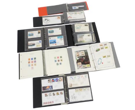 Philately. Postage stamps, GB Travel first day covers, The St Kitts mint commemoratives, and four albums of GB and Isle of Ma