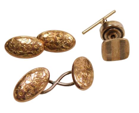 A pair of 9ct two colour gold oval and scroll link cufflinks, with engraved floral and foliate decoration, together with a 9c