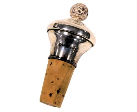 An Elizabeth II silver mounted bottle stopper, with a golf ball terminal, Birmingham 2001.