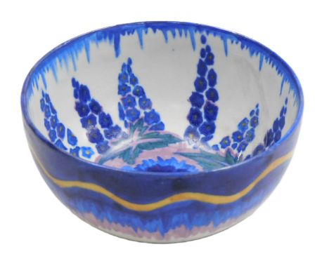 A 1930's Carlton Ware Handcraft bowl, painted in blue with hollyhocks, 10.5cm wide.