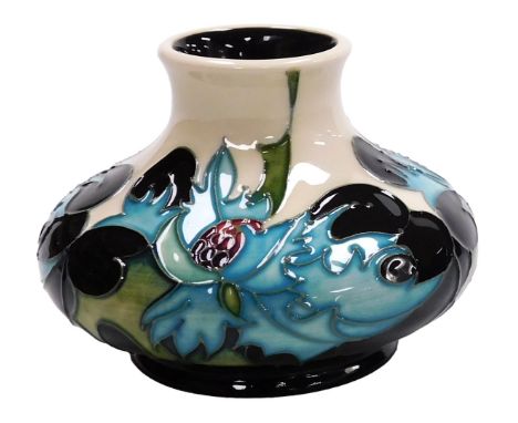 A Moorcroft pottery Sea Holly pattern vase, circa 2006, painted and impressed marks, boxed, 7.5cm high.
