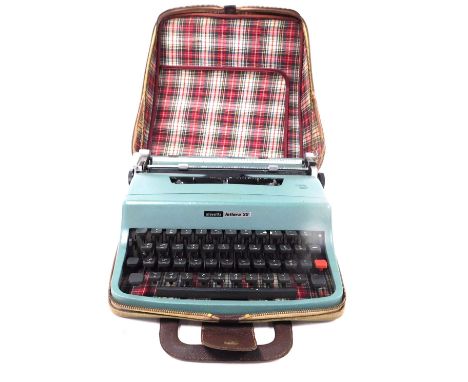 An Olivetti Arabic script keyboard typewriter, lettera 32 model, turquoise cased, with carry case.