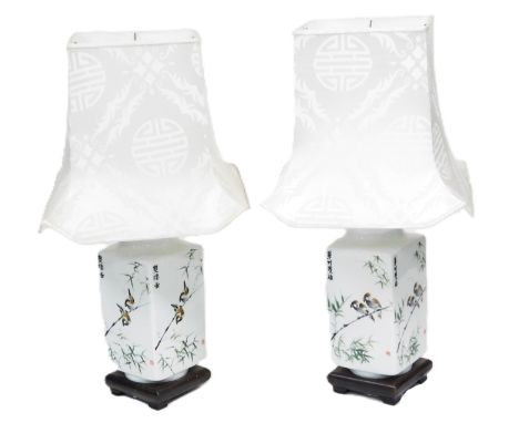 A pair of Chinese Republic porcelain 'cong' vases, with table lamp fitments, painted with pair of finches on bamboo, four cha