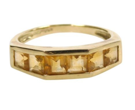 A 9ct gold and citrine six stone ring, in a bridged channel setting, size R 1/2, 3.7g.
