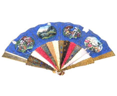 A 19thC Chinese paper fan, painted with figures, with pierced and carved lacquer and mother of pearl and enamelled sticks, gi