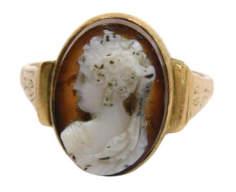 A hardstone cameo ring, bust portrait of a lady, in a yellow metal shank with engraved shoulders, yellow metal stamped 9ct, 4