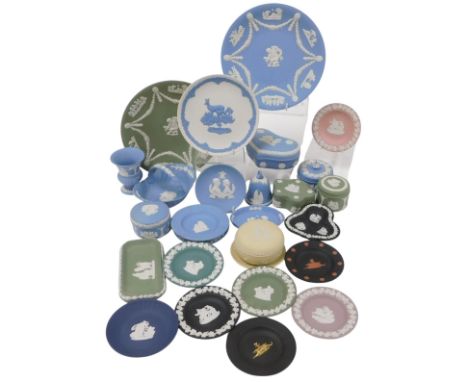 A group of Wedgwood Jasperware, various colourways, including plates, dishes, boxes and covers, basket, and a bell. (a quanti