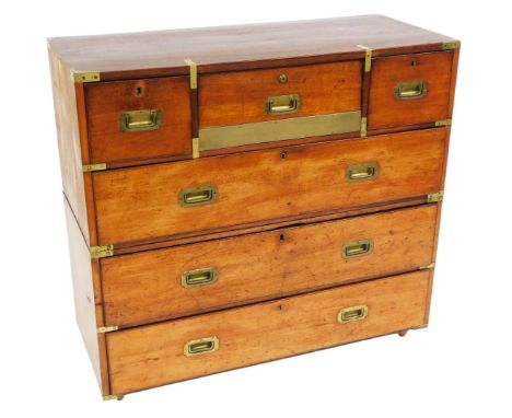 A 19thC Maple &amp; Co teak and brass bound campaign chest, with a central fitted secretaire drawer, with brass Bramah lock, 