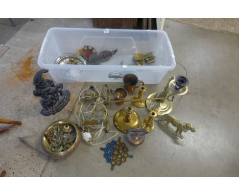 A quantity of metalware, including a Victorian cast iron Punch door stop, lighting, etc. 