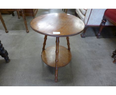 An oriental red lacquered octagonal occasional table and a Victorian circular mahogany two tier occasional table 