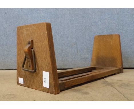 An Arts and Crafts oak book slide 